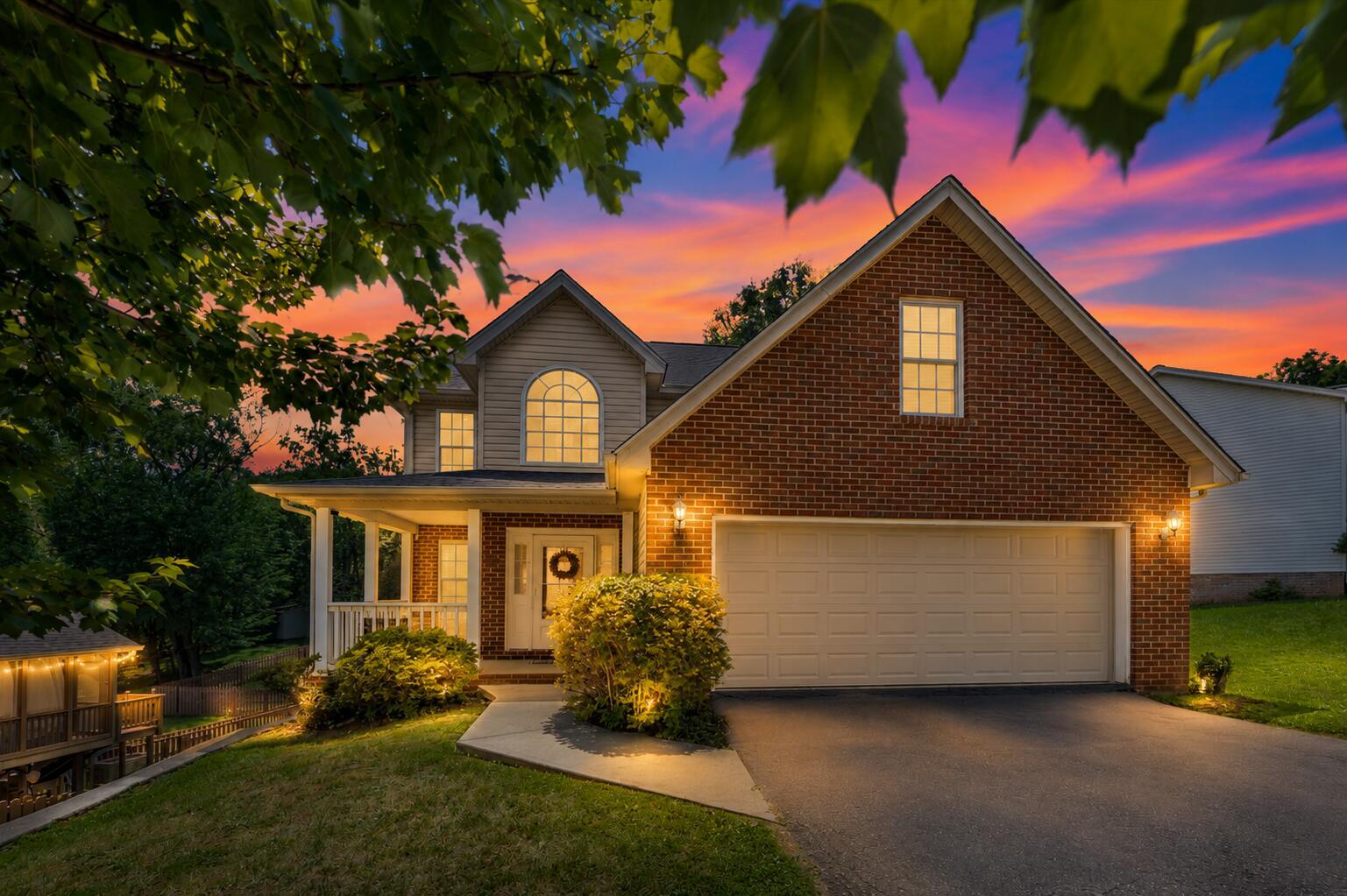Image 1: some exterior lighting virtually staged