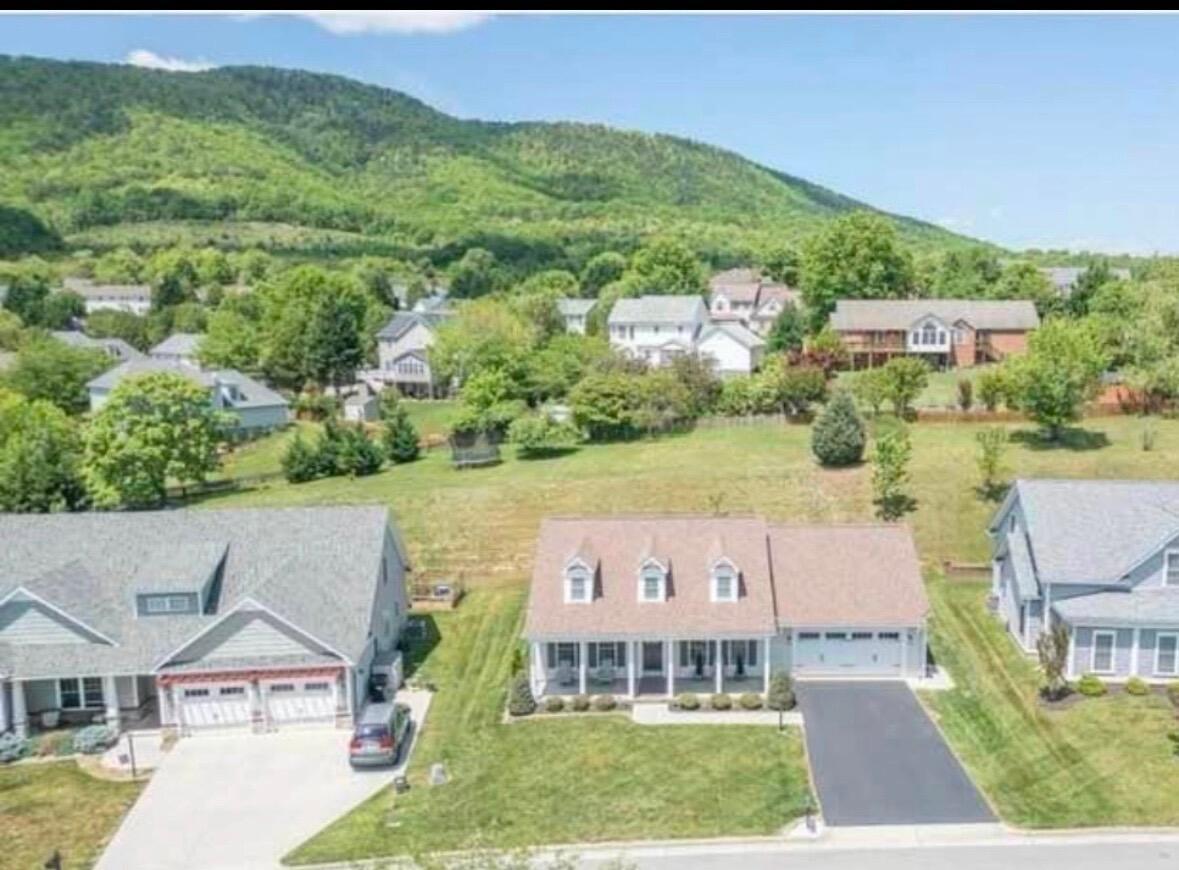 Image 2: Aerial view of home and mountains