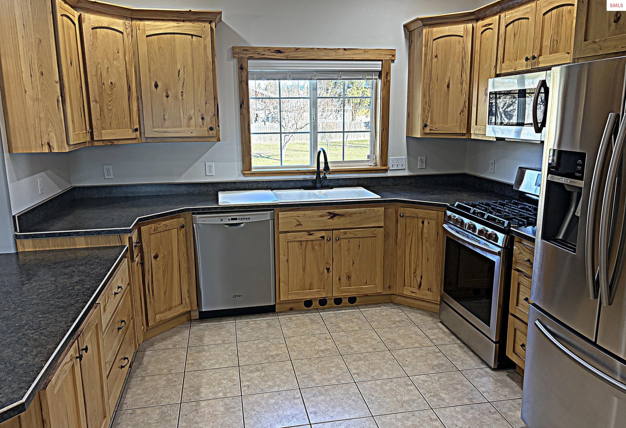 Image 3: Hickory cabinetry