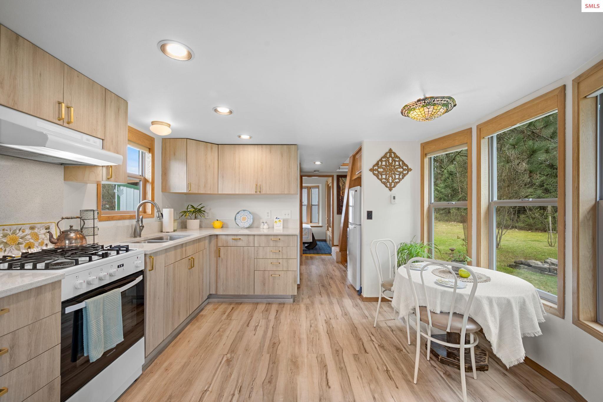 Image 3: Corian countertops, soft-close cabinets and drawers. All appliances included!