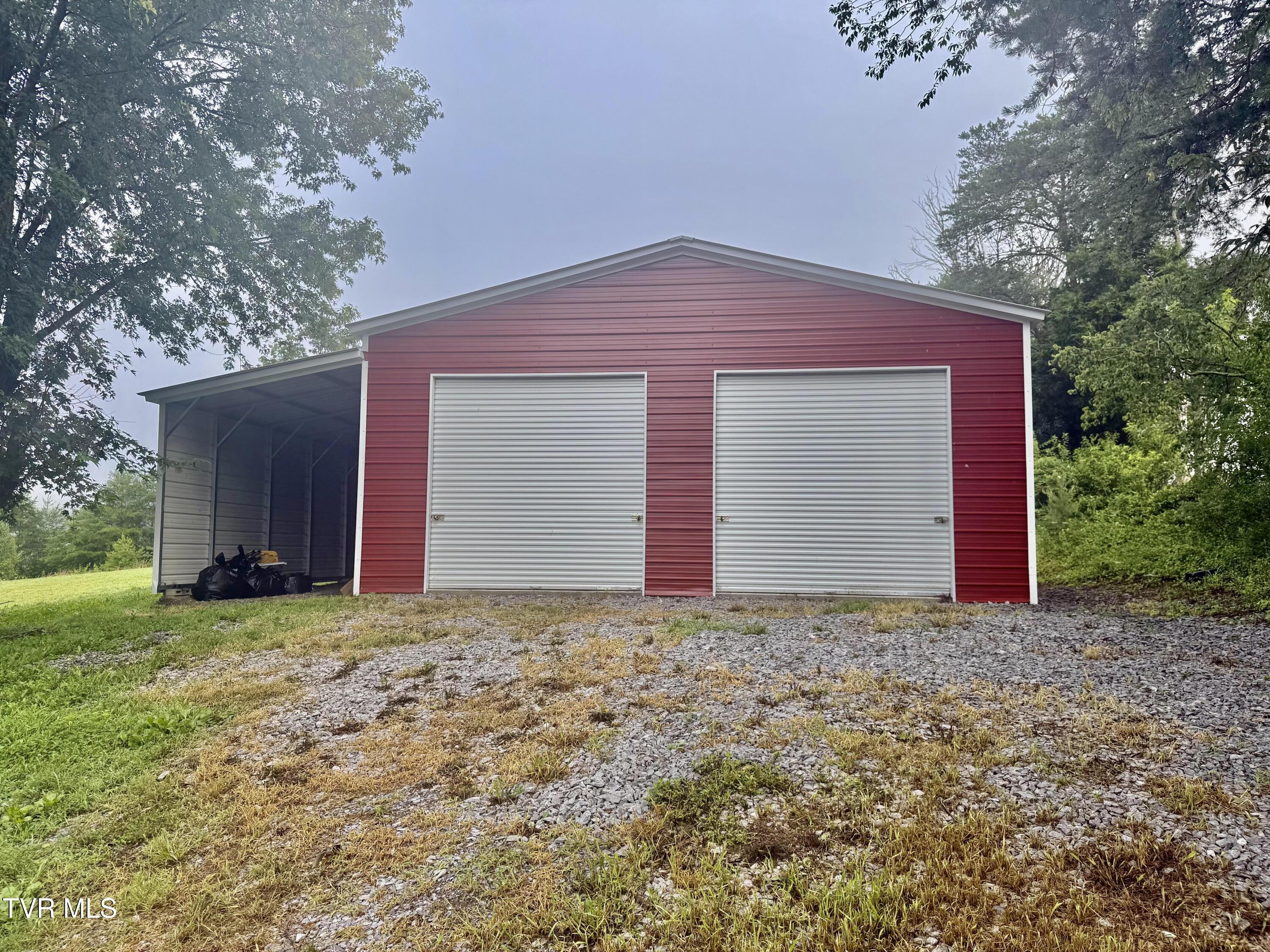 Image 4: betner outside garage 1