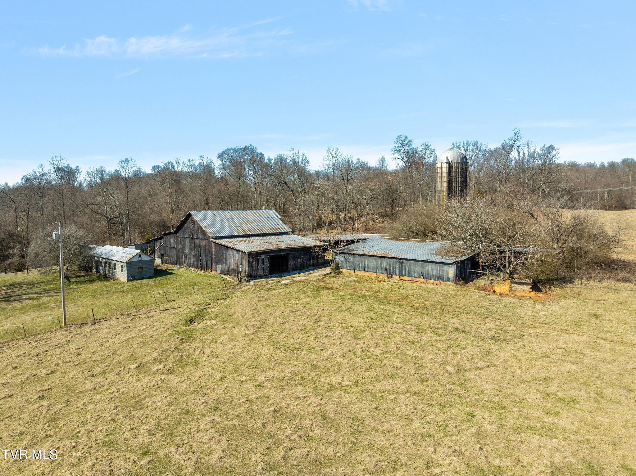 Image 2: Barns on property