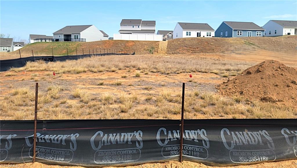 Image 3: Actual Photo of future homesite. See Completion Date.