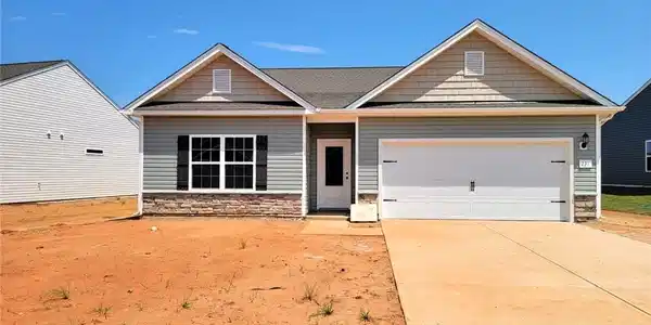 Image 2: Actual Photo of home prior to sod