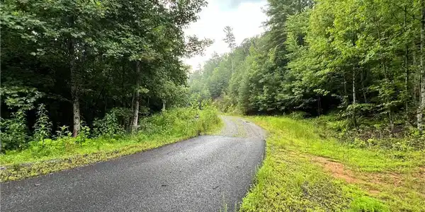 Image 4: Access Road goes from paved to gravel