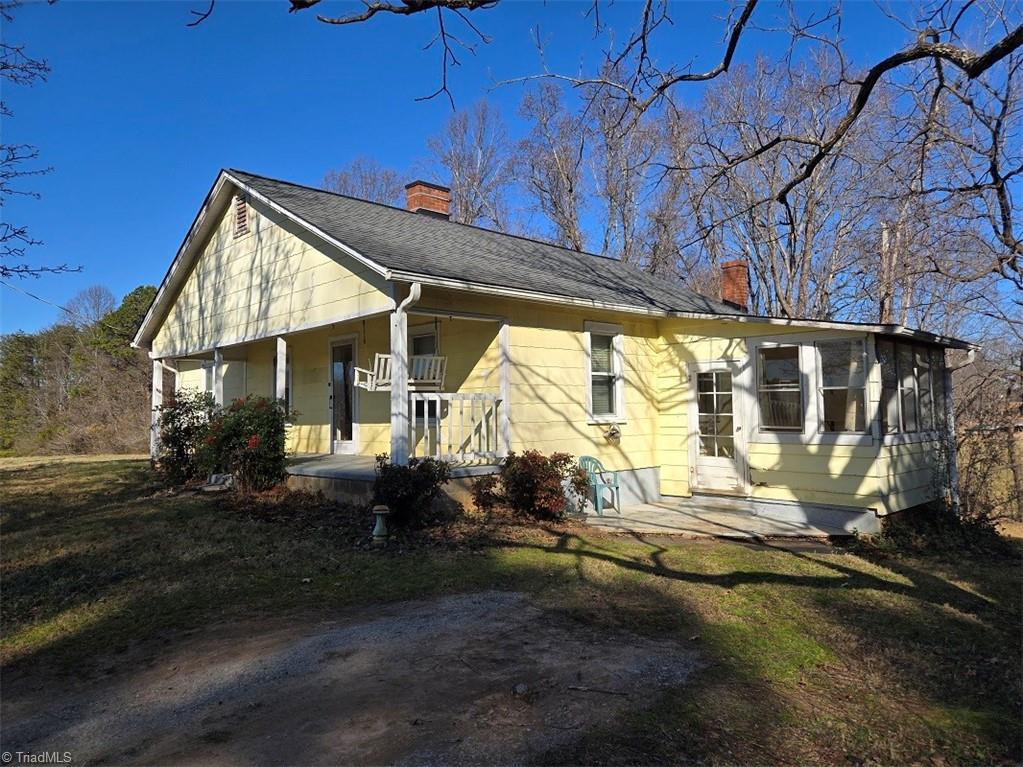 Image 4: 1949 cottage with wide front porch