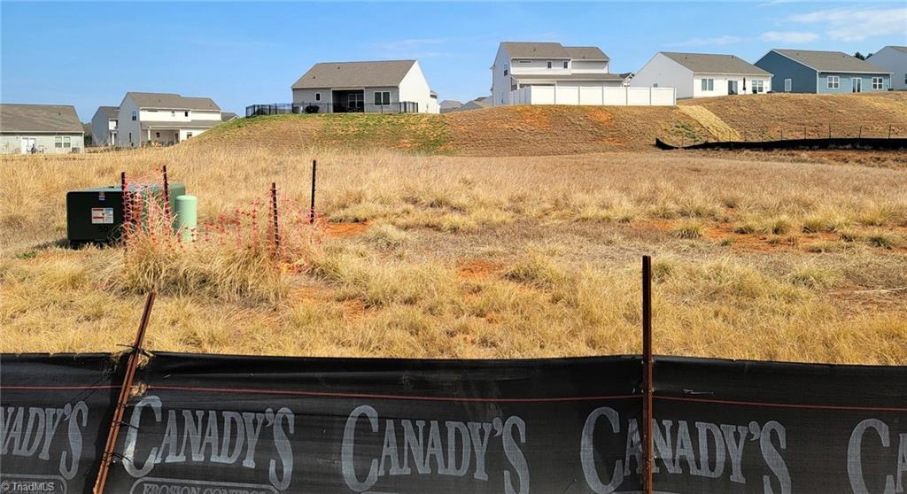 Image 3: Actual Photo of future homesite. See Completion Date.