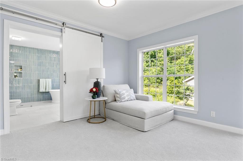 Image 2: Primary bedroom with ensuite luxury bath