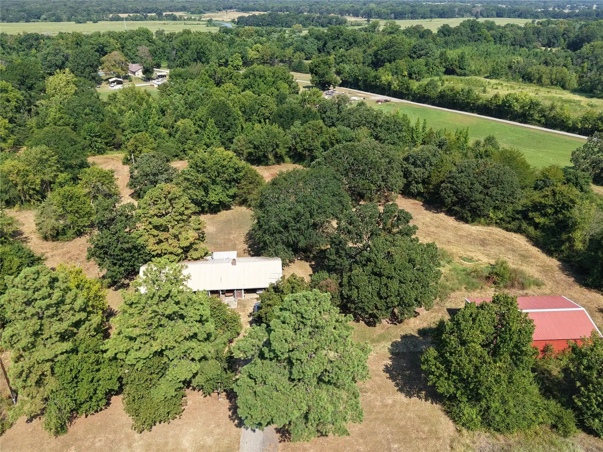 Image 1: Extensive property featuring a primary residence,