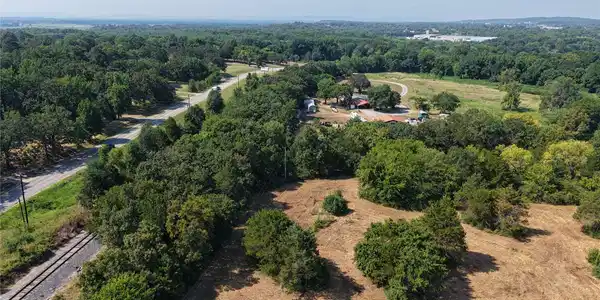 Image 3: Expansive rural property featuring a mix of cleare