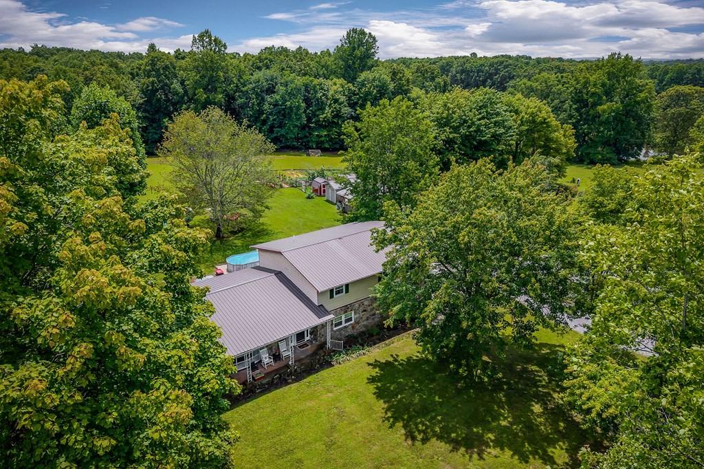 Image 2: Aerial view of the home