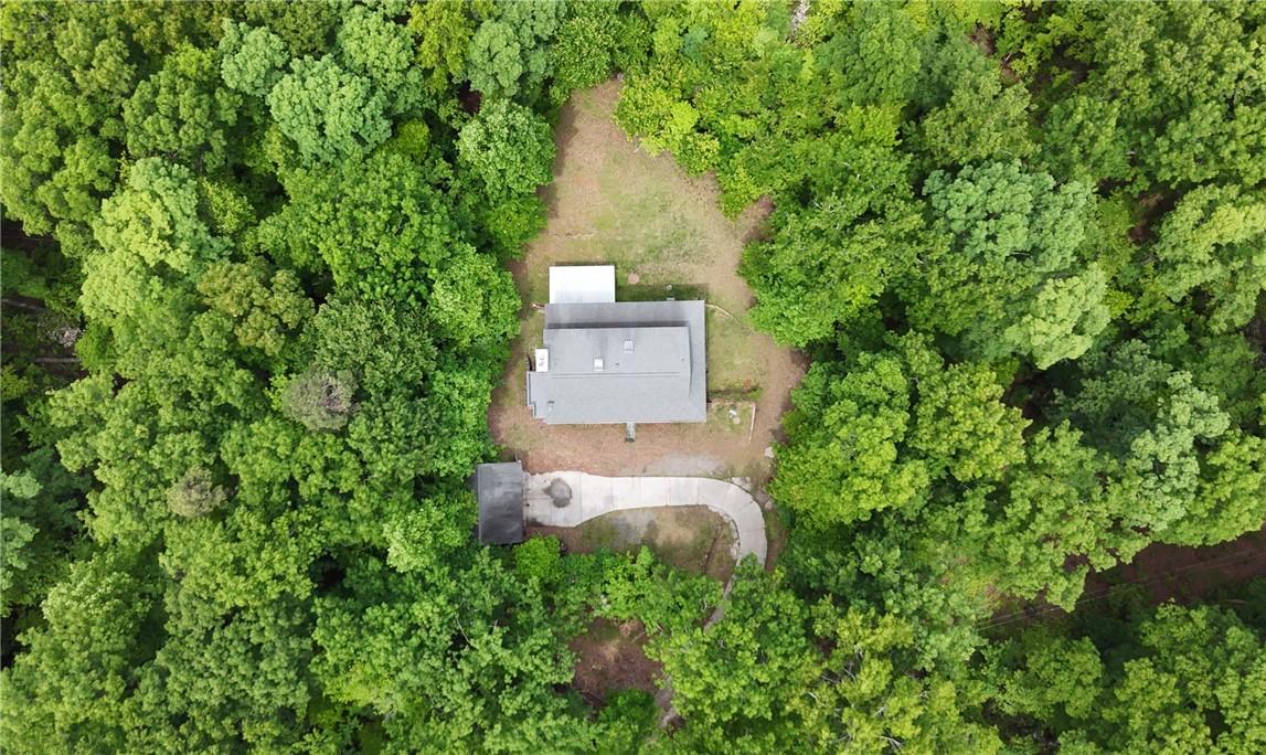 Image 3: This aerial view showcases a private residence nes
