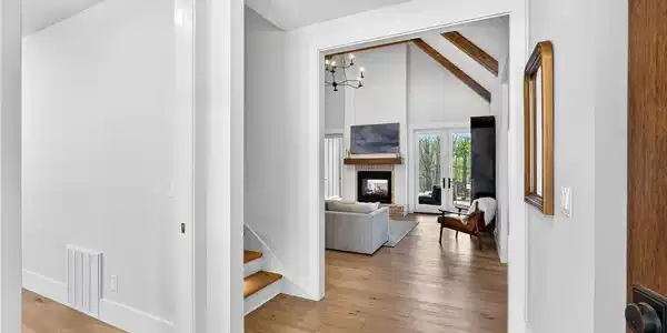 Image 4: This inviting entryway seamlessly connects to a sp