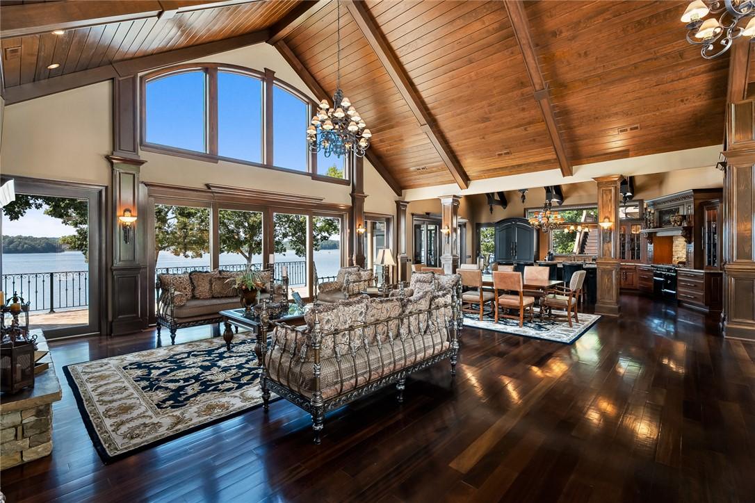 Image 2: Discover elegant living with vaulted wood ceilings
