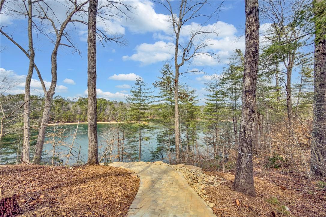 Image 3: This tranquil waterfront setting offers a serene e