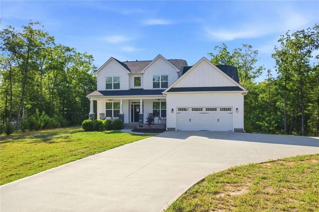 Image 1: This inviting residence features a well-maintained