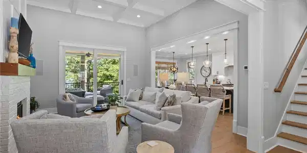Image 4: An inviting open floorplan living area flows seaml