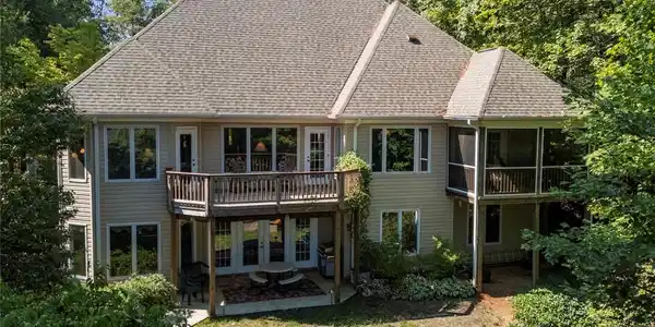 Image 3: This house features multiple decks and patios, per