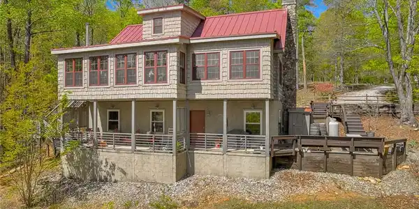 Image 2: This elevated home offers panoramic views and peac
