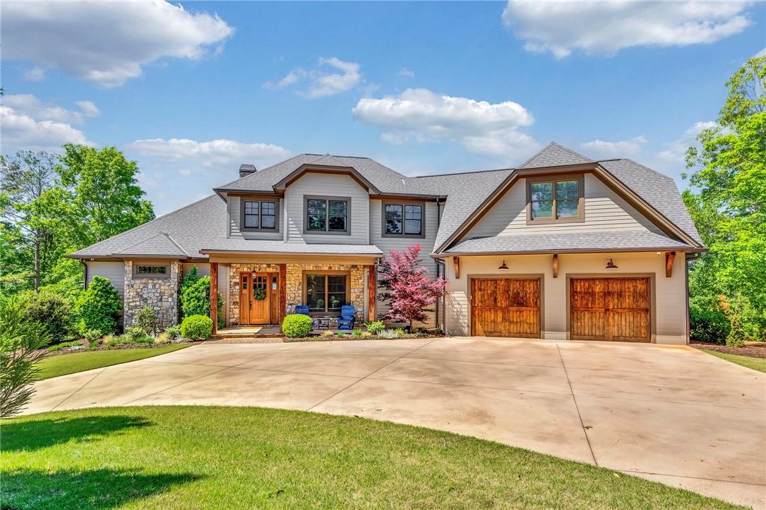 Image 1: This spacious residence features a two-car garage,