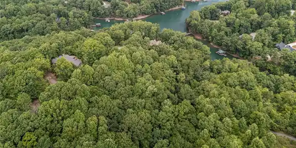 Image 4: An aerial perspective reveals a serene waterfront
