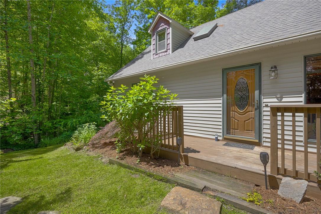 Image 2: This charming home offers a welcoming facade with