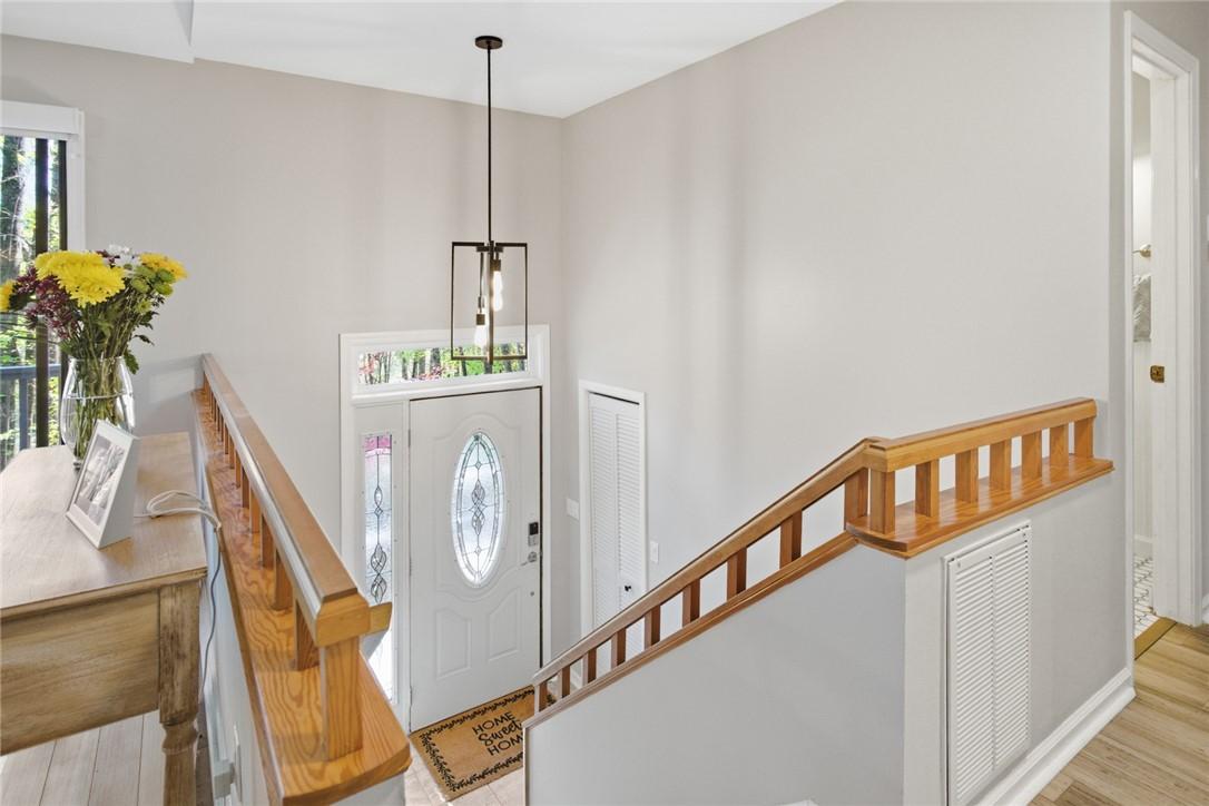 Image 3: This entry offers a bright welcome with classic ar