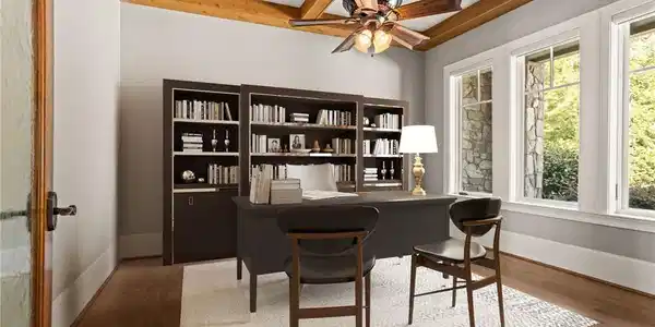Image 4: Rich wood-beamed ceilings and warm hardwood floori