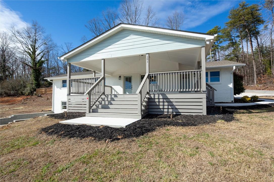Image 2: This charming home offers a welcoming facade with