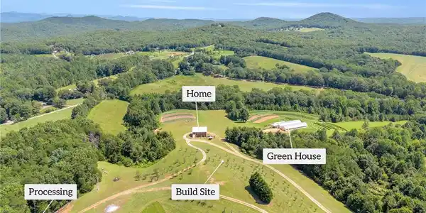 Image 3: Rolling green hills and majestic mountain ridges f