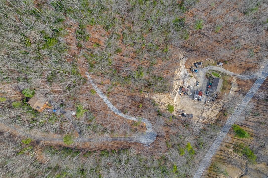 Image 2: This elevated view captures a secluded property ne