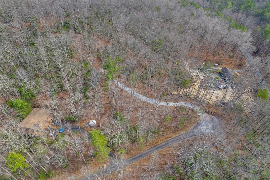 Image 4: This secluded property offers private roads and lu