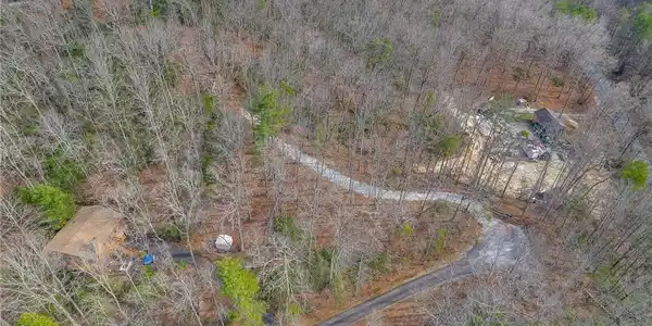 Image 4: This secluded property offers private roads and lu