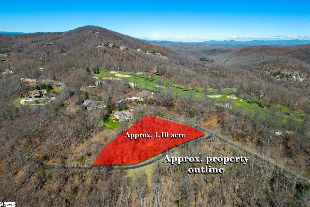 Image 3: A sweeping aerial view reveals a generous property