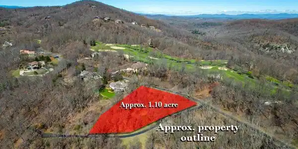 Image 3: A sweeping aerial view reveals a generous property