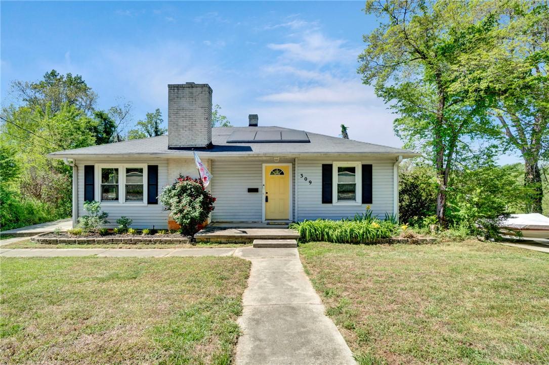 Image 2: This charming residence features a well-maintained