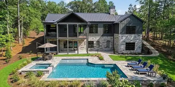 Image 3: This is an Ai photo of a pool in the back yard gen