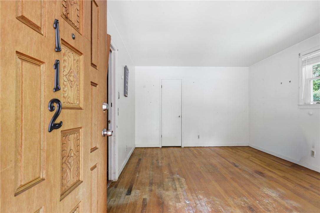 Image 2: Enter into a bright, open space featuring original