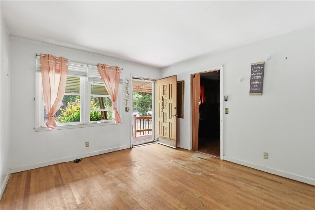 Image 3: Natural light filters through the windows, illumin
