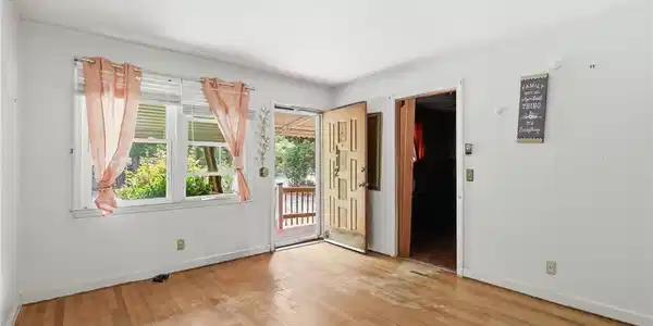 Image 3: Natural light filters through the windows, illumin