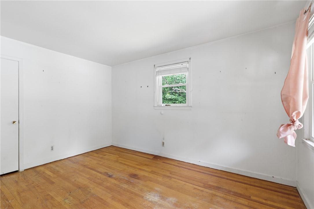 Image 4: Primary Bedroom opens to back porch.